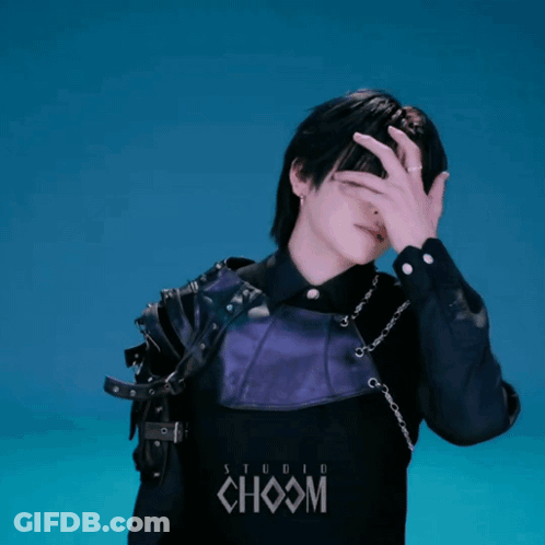 Man In Black Purple Covering Face At Studio Choom Logo GIF