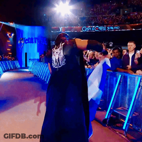 Man In Black Robe At Clash Of Castles Scotland Sign GIF