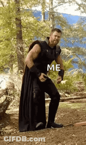 Man In Black Robe Dancing In Forest GIF