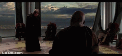 Man In Black Robe Standing GIF