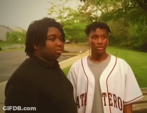 Man In Black Shirt And Baseball Cap With Funny High Five GIF