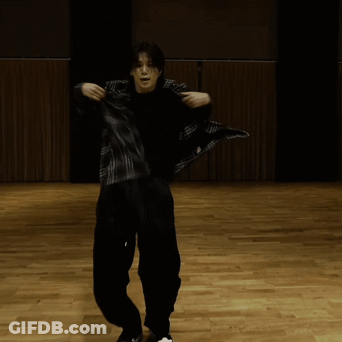 Man In Black Shirt And Black Pants On Wooden Floor GIF