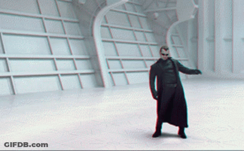 Man In Black Shirt And Gloves Blue Background GIF