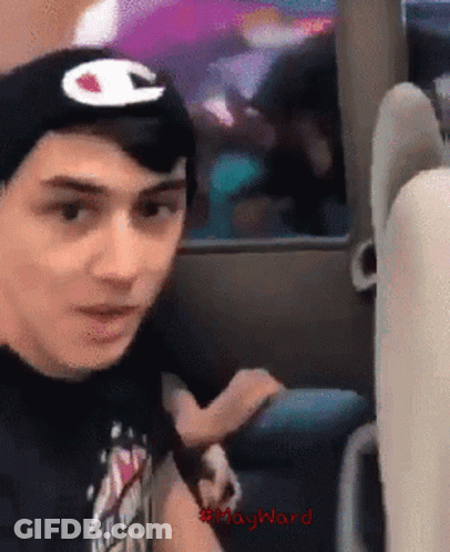 Man In Black Shirt And Hat With Champion Logo GIF