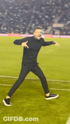 Man In Black Shirt And Pants Dancing GIF