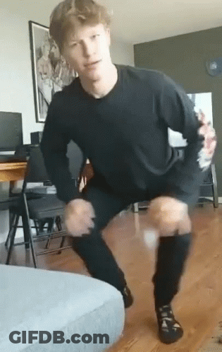 Man In Black Shirt And Pants Squatting GIF