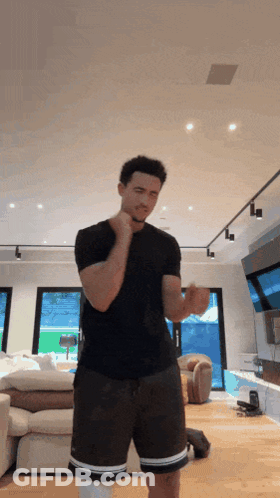 Man In Black Shirt And Shorts GIF