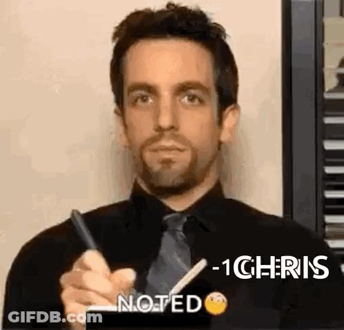 Man In Black Shirt And Tie Writing GIF