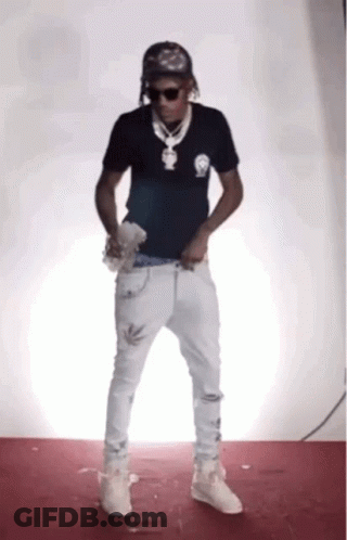 Man In Black Shirt And White Jeans Dancing GIF