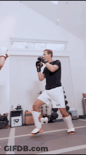 Man In Black Shirt And White Shorts GIF