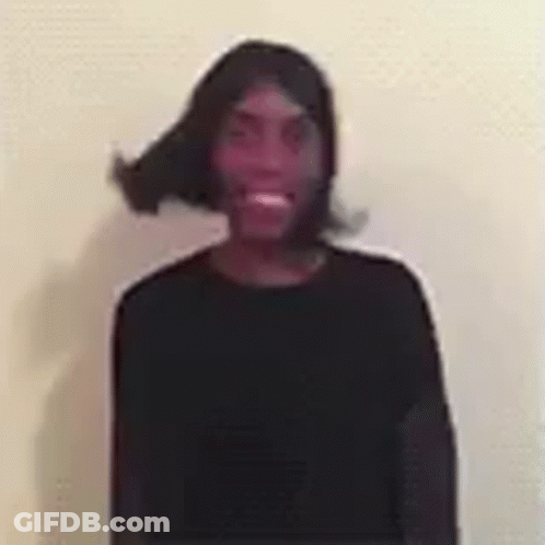 Man In Black Shirt And Wig Smiling GIF
