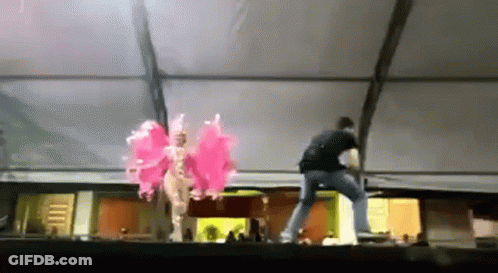 Man In Black Shirt And Woman In Pink GIF