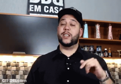 Man In Black Shirt At Em Casa Sign GIF