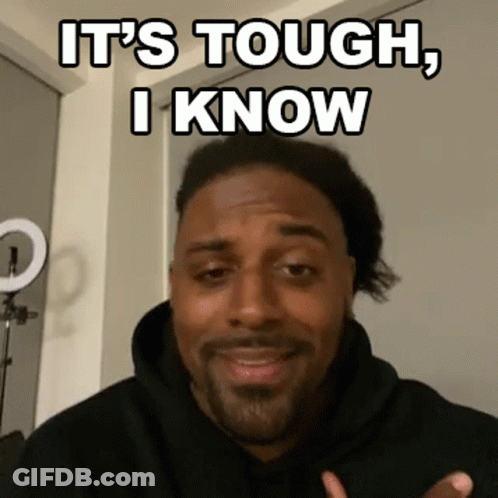Man In Black Shirt At Red Brick Wall GIF