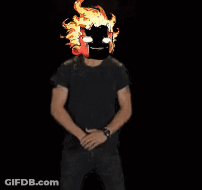 Man In Black Shirt Before Fire Saying Do It GIF