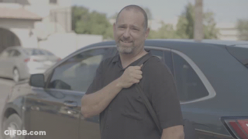Man In Black Shirt Carrying Backpack GIF