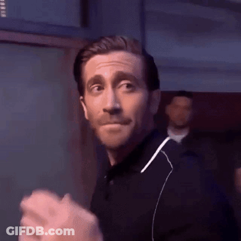 Man In Black Shirt Clapping And Smiling GIF