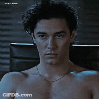 Man In Black Shirt Dancing In Front Of Blinds GIF