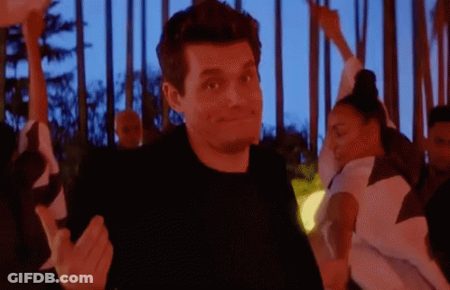 Man In Black Shirt Dancing In Front Of Crowd GIF