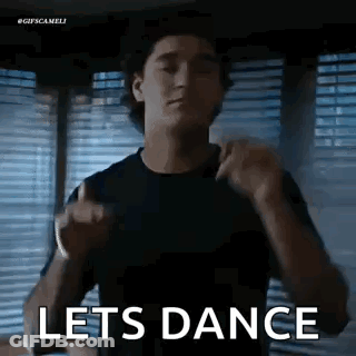 Man In Black Shirt Dancing Says Lets Dance GIF