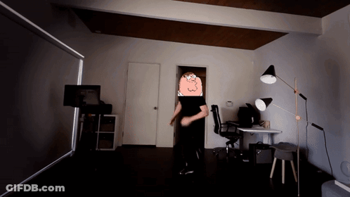 Man In Black Shirt Dancing With Cartoon Character GIF