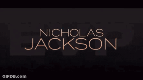 Man In Black Shirt Dancing With Microphone In Green Light GIF