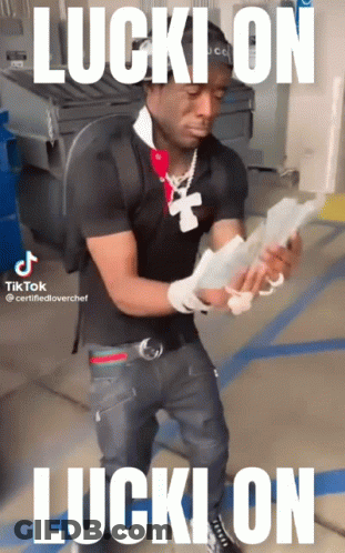 Man In Black Shirt Holding Money GIF