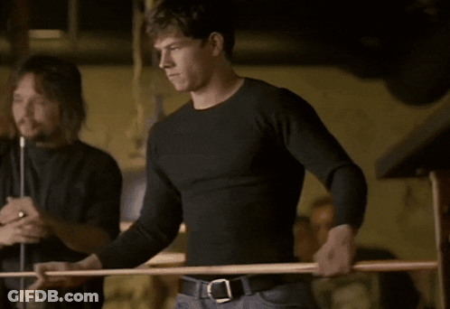 Man In Black Shirt Holding Pool Cue GIF