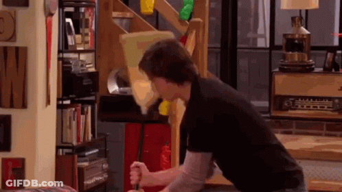 Man In Black Shirt Holding Screwdriver GIF