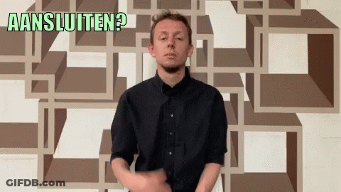 Man In Black Shirt In Front Of Aansluiten Wall GIF