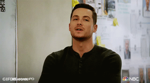 Man In Black Shirt In Front Of Sticky Note Wall With Chicagopd GIF