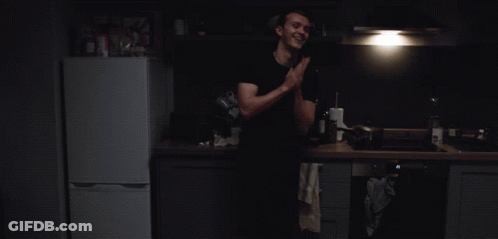 Man In Black Shirt In Kitchen GIF