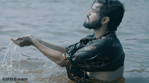 Man In Black Shirt In Water GIF