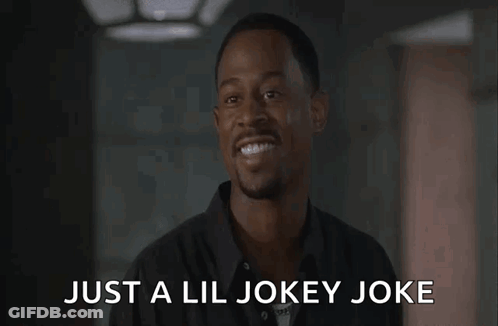 Man In Black Shirt Laughing Just A Lil Jokey Joke GIF