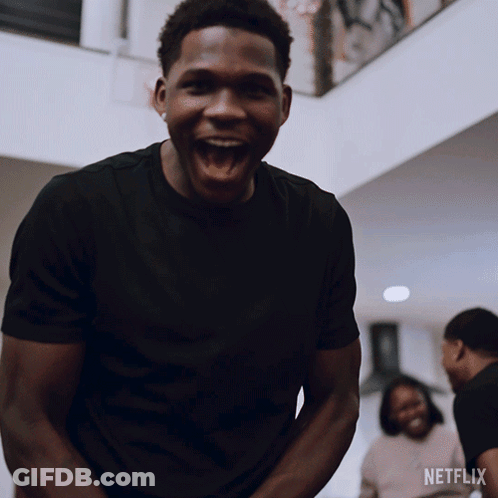 Man In Black Shirt Laughing Netflix Logo GIF