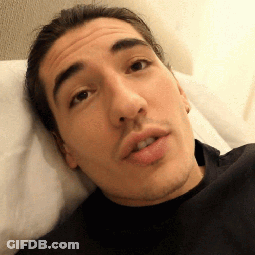 Man In Black Shirt Laying On Bed GIF