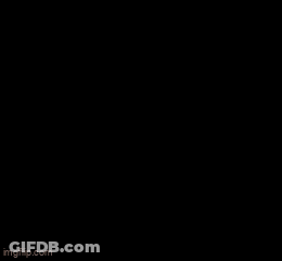 Man In Black Shirt Looking Down GIF