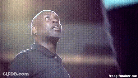 Man In Black Shirt Looking Up At Screen GIF
