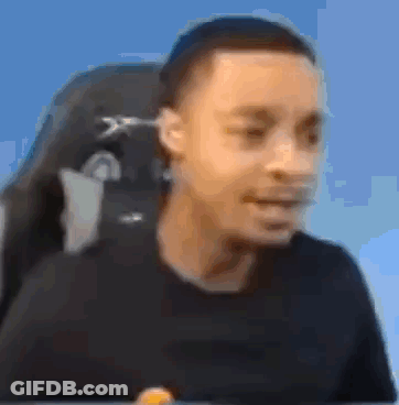 Man In Black Shirt Making Face GIF