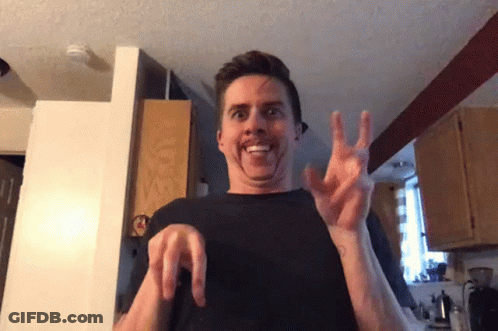 Man In Black Shirt Making Face With Hands GIF