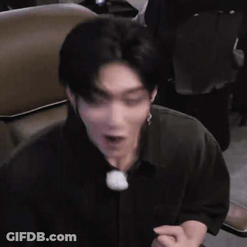 Man In Black Shirt Making Face GIF