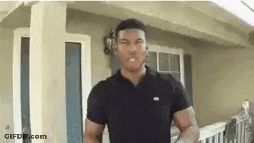 Man In Black Shirt Making Funny Face GIF
