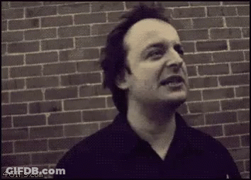 Man In Black Shirt Making Funny Face GIF