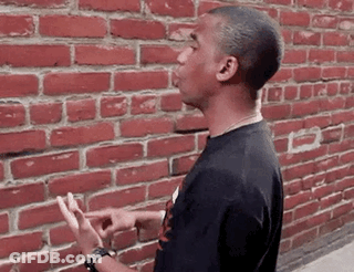 Man In Black Shirt Making Funny Face GIF