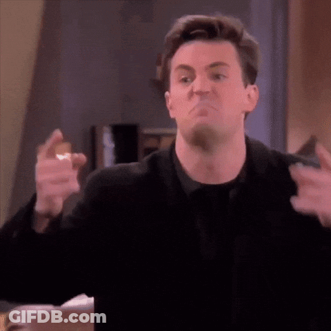 Man In Black Shirt Making Funny Face With Hands GIF
