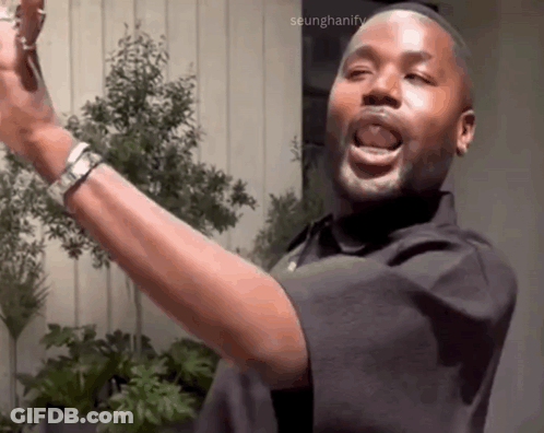 Man In Black Shirt Making Funny Face GIF