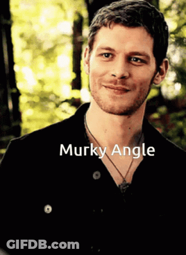 Man In Black Shirt Murky Angle GIF
