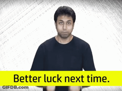 Man In Black Shirt Next To Better Luck Sign GIF