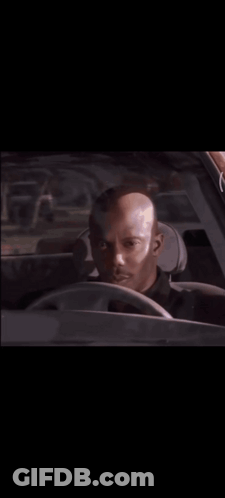 Man In Black Shirt Next To Man In Blue Shirt GIF