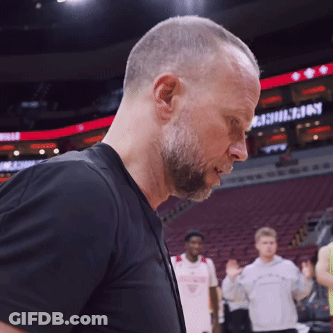 Man In Black Shirt On Basketball Court With Washington Sign GIF